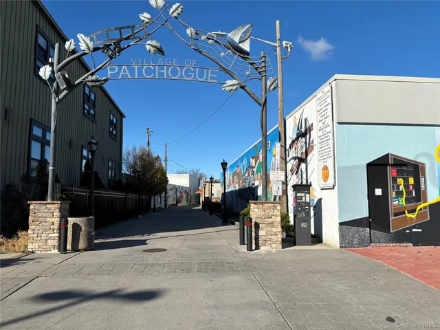 a view of a building with traffic signal lights