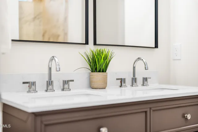 a bathroom with sink and a mirror