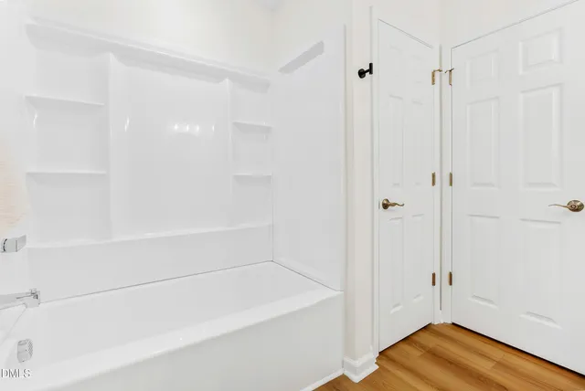 a bathroom with a bathtub