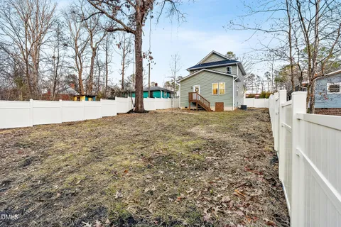 a view of large house with a outdoor space