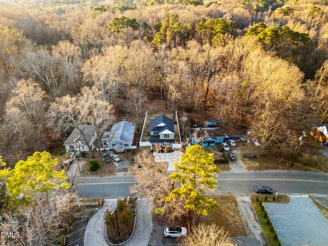 a view of yard along with trees