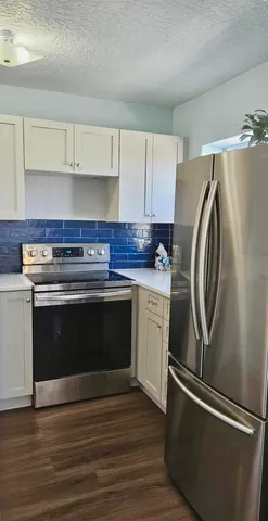 a bathroom with a shower and a toilet