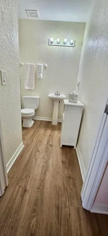 a view of table and chairs in patio