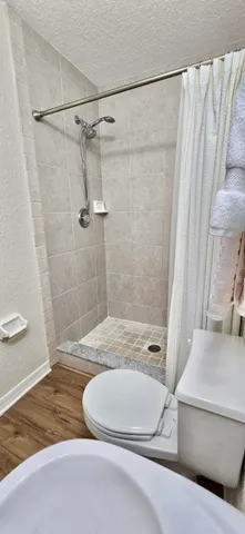 a room with bookshelf and a book shelf