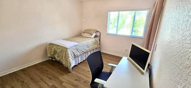 a view of living room and kitchen with furniture