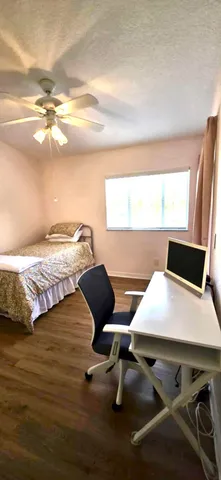 a view of swimming pool from a balcony