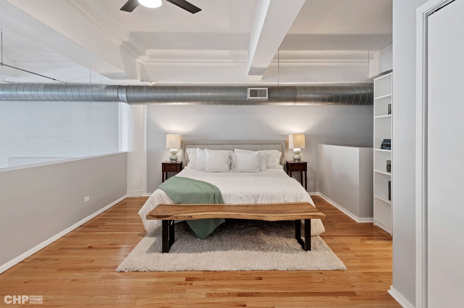 2000 South Michigan Avenue, Unit 107 Chicago, IL 60616 - Photo 13 of 30 a bedroom with a bed and a window