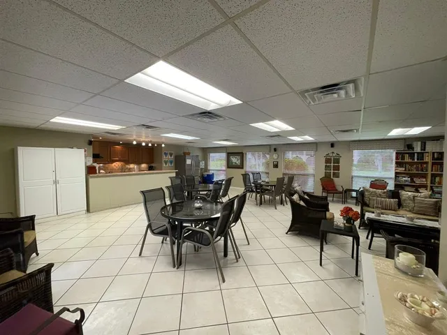 a group of people sitting in a room