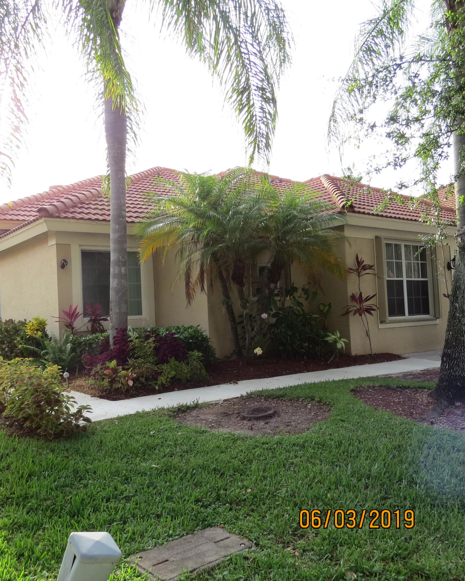 1061 Aspri Way Riviera Beach, FL 33418 - Photo 3 of 36 Front
