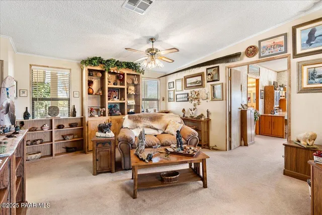 a bed room with furniture and a chandelier