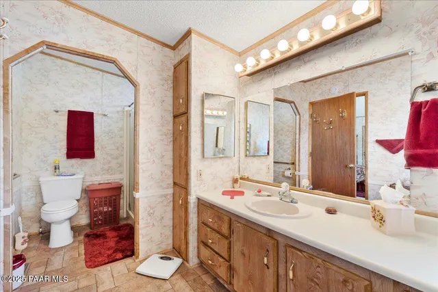 a view of a dinning room with wooden floor and furniture