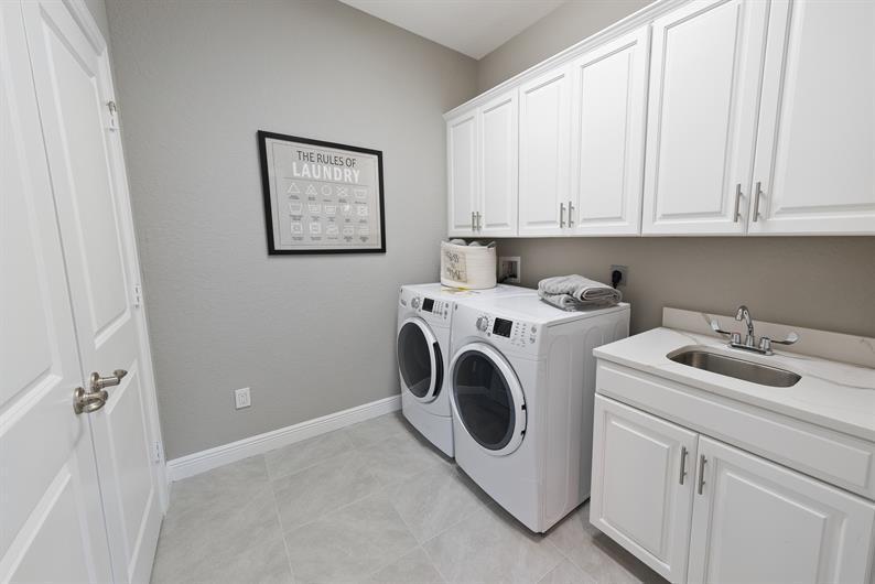 4852 Southwest Millbrook Lane Stuart, FL 34997 - Photo 20 of 37 Second Story Laundry Room