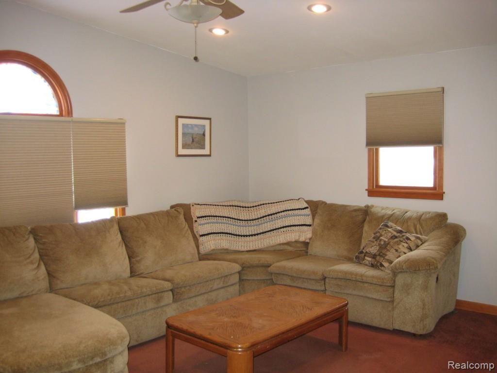 2257 Fowlerville Road Fowlerville, MI 48836 - Photo 8 of 9 FAMILY ROOM