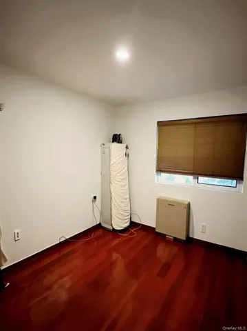 a living room with a flat screen tv