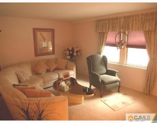 11 Highland Terrace Fords, NJ 08863 - Photo 3 of 6 a living room with furniture and a couch