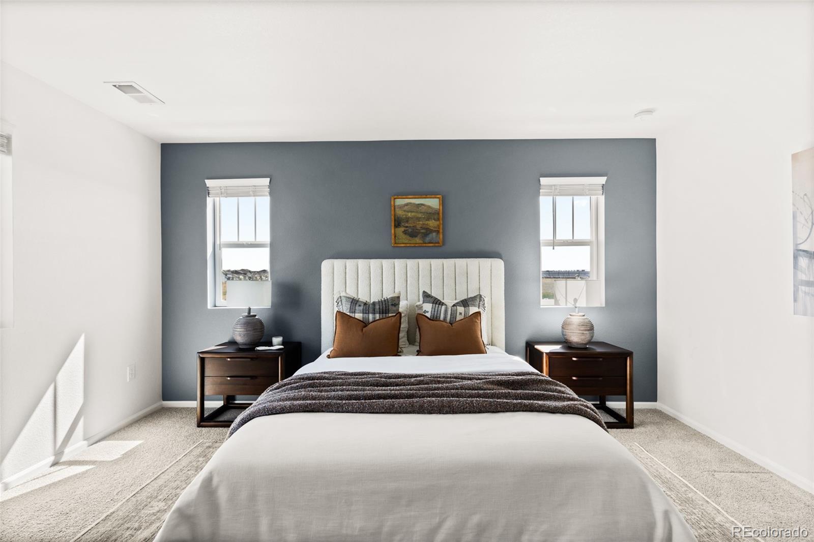 9054 Truckee Court Commerce City, CO 80022 - Photo 28 of 49 a bedroom with a bed and a window