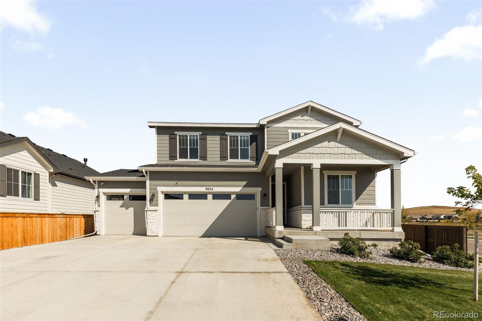 9054 Truckee Court Commerce City, CO 80022 - Photo 44 of 49 a front view of a house with a yard