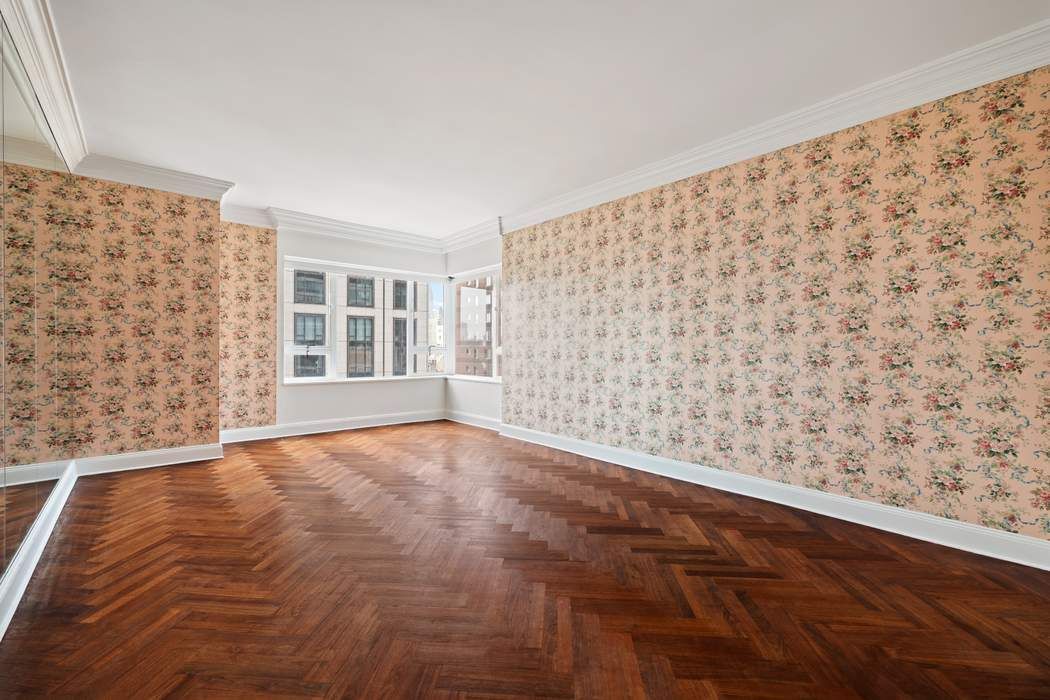 425 East 58th Street, Unit 21E Manhattan, NY 10022 - Photo 11 of 19 a view of an empty room with a window