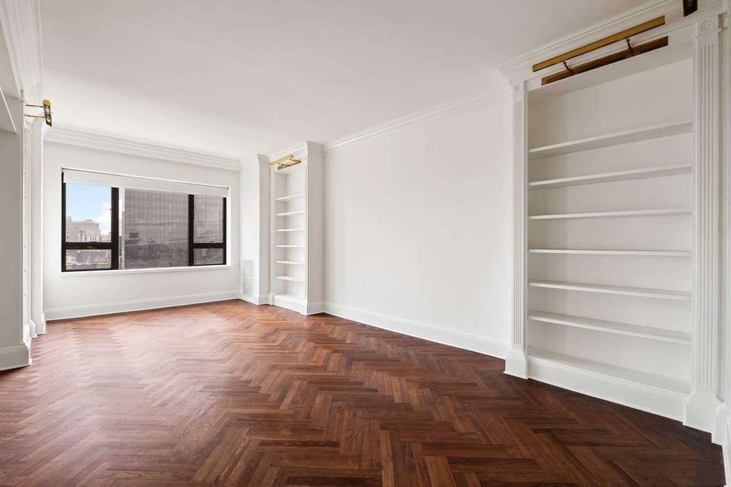 425 East 58th Street, Unit 21E Manhattan, NY 10022 - Photo 6 of 19 a view of an empty room with a window