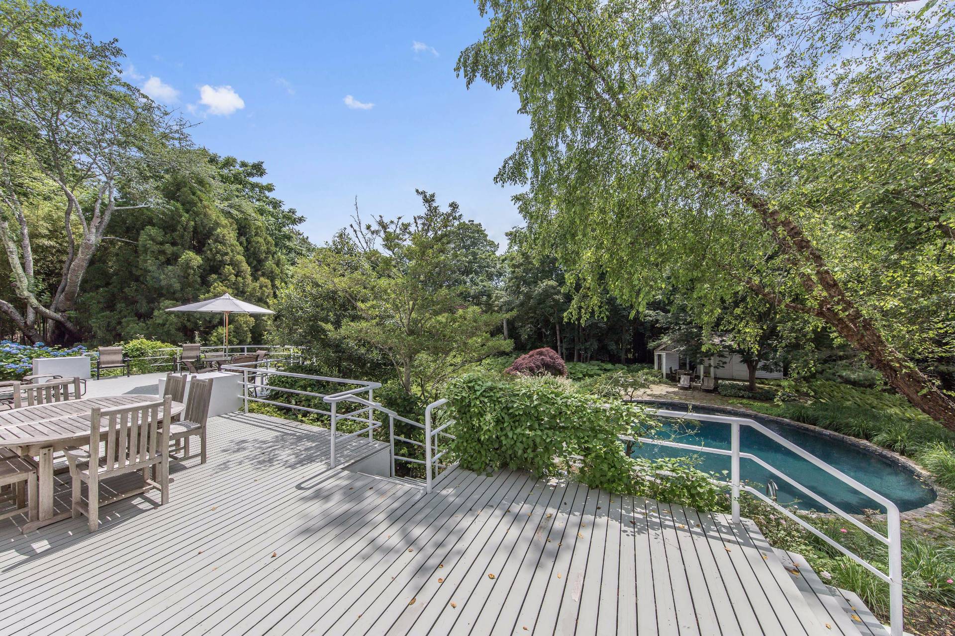 86 Georgica Road East Hampton, NY 11937 - Photo 17 of 20 a view of balcony with deck and outdoor seating