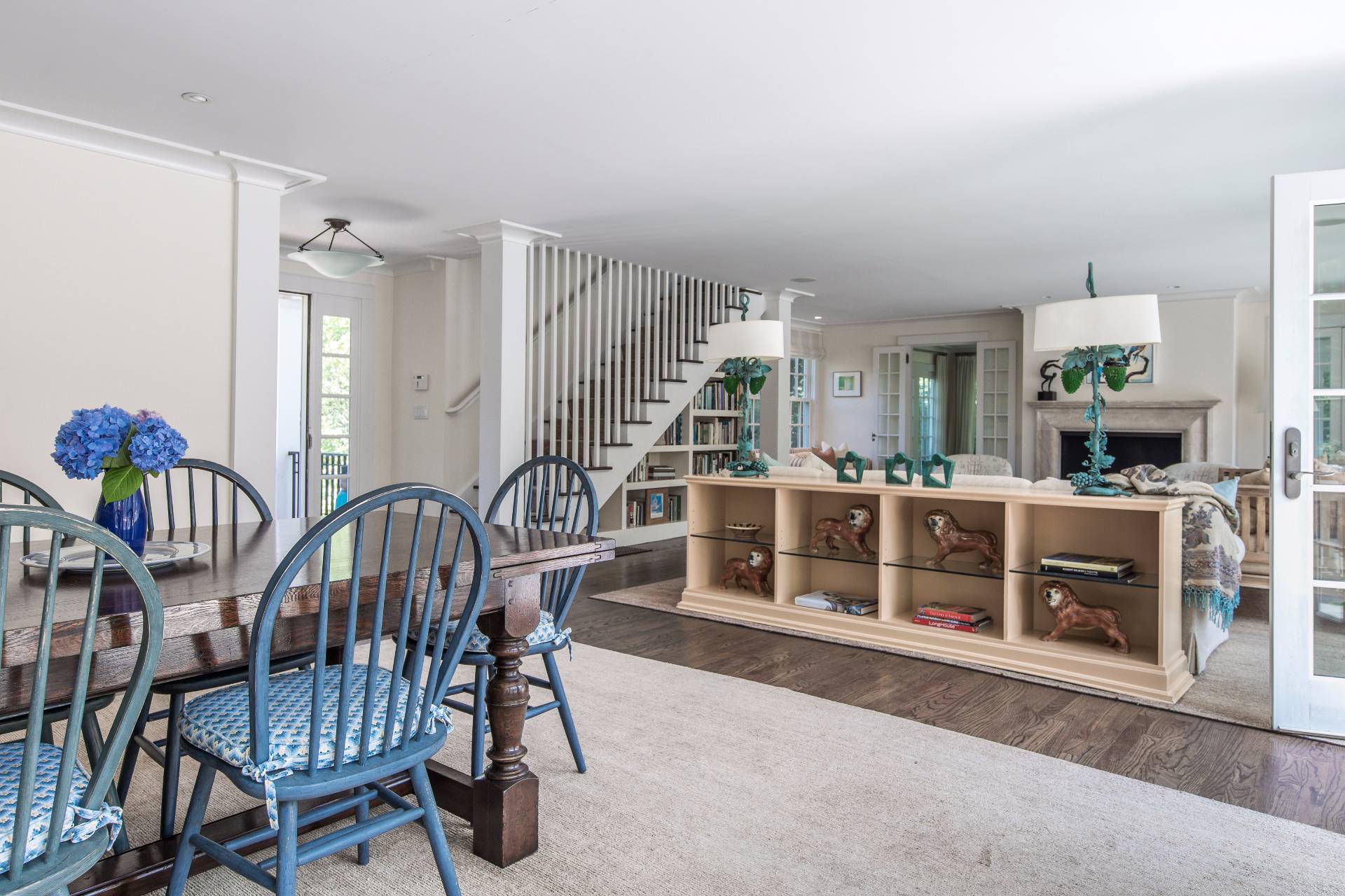 86 Georgica Road East Hampton, NY 11937 - Photo 8 of 20 a view of a dining room with furniture and chandelier