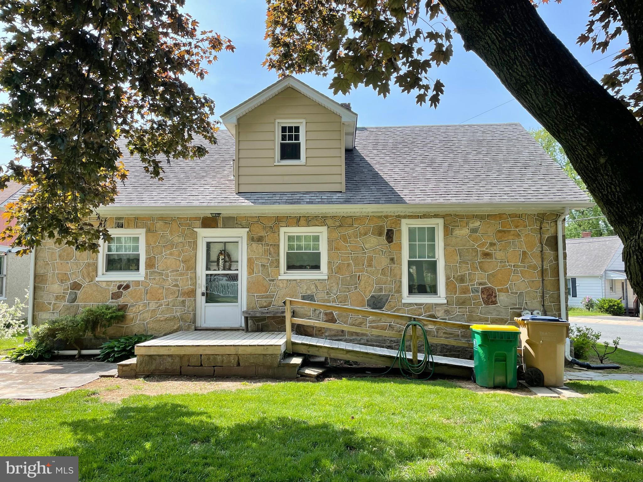 105 Pearl Street Rising Sun, MD 21911 - Photo 2 of 31 REAR VIEW WITH DECK, STONE PATIO, & RAMP