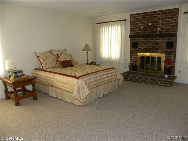 8201 Chamberlayne Road Richmond, VA 23227 - Photo 4 of 12 Master Bedroom - Large master bedroom with firepla