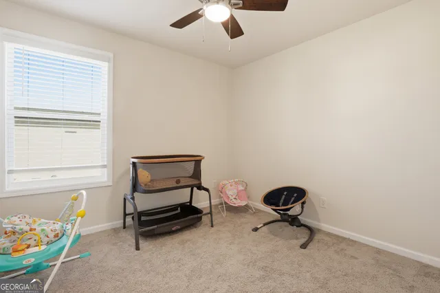 a view of a chairs and table in the terrace