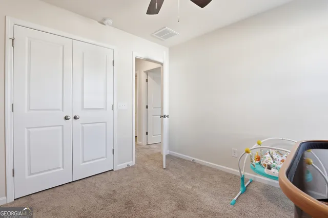 a view of a terrace with couches and wooden floor
