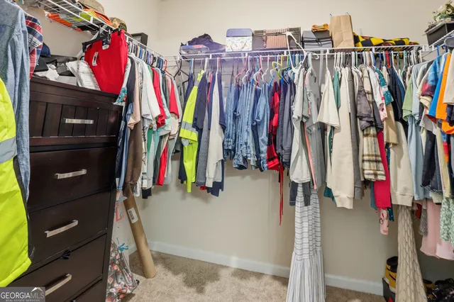 a view of an house with a big yard
