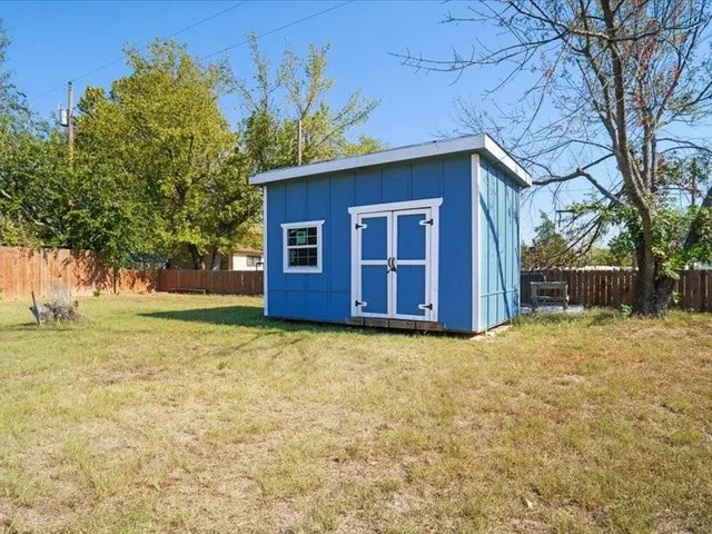 a house with trees in front of it