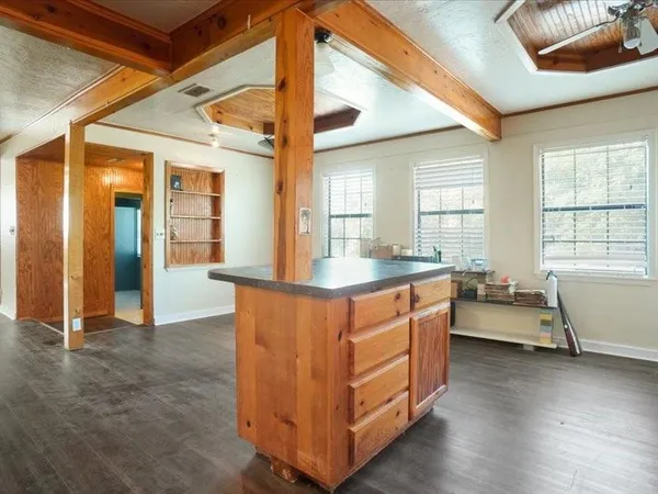 a room with furniture and window
