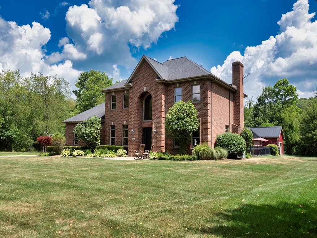 164 Robinson Run Road Butler, PA 16002 - Photo 1 of 25 a front view of a house with a yard