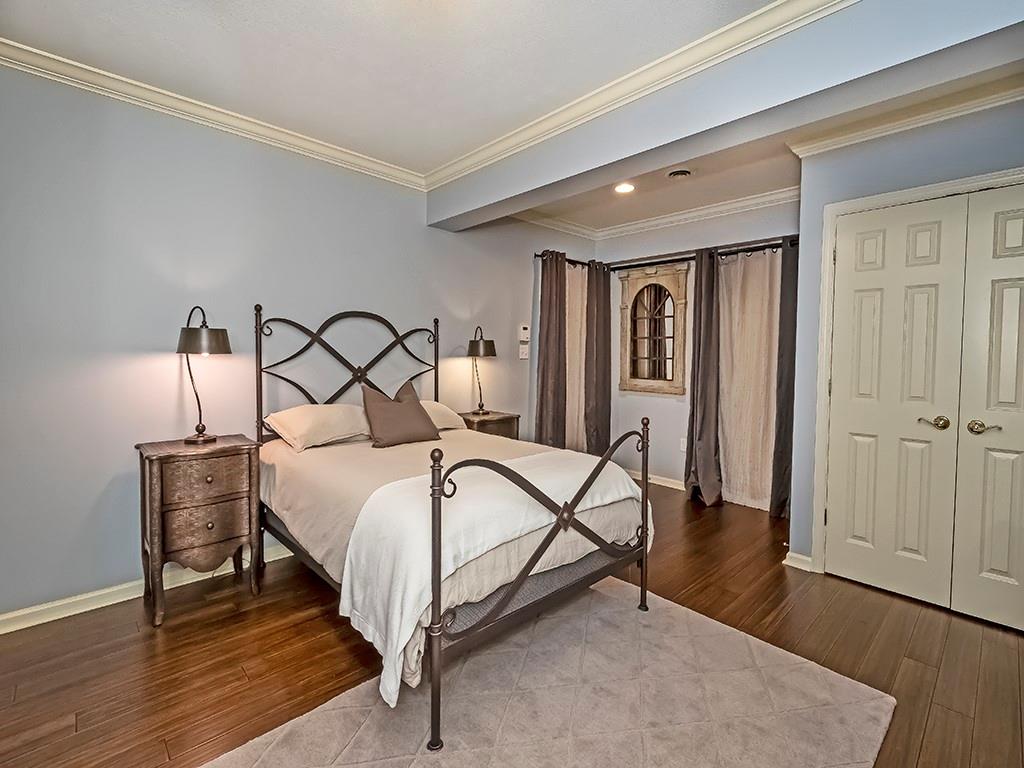 164 Robinson Run Road Butler, PA 16002 - Photo 16 of 25 a bedroom with a bed and wooden floor