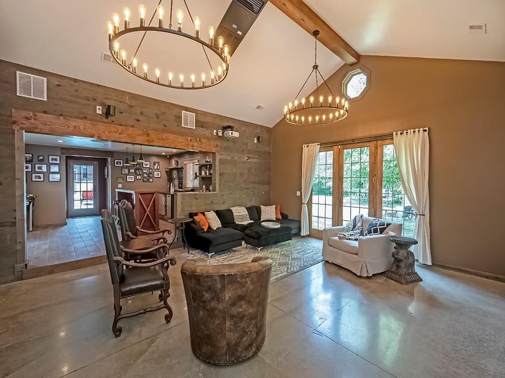 164 Robinson Run Road Butler, PA 16002 - Photo 21 of 25 a living room with furniture a large window and wooden floor