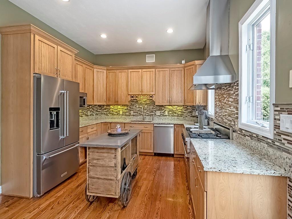 164 Robinson Run Road Butler, PA 16002 - Photo 7 of 25 a kitchen with stainless steel appliances granite countertop a sink stove and refrigerator
