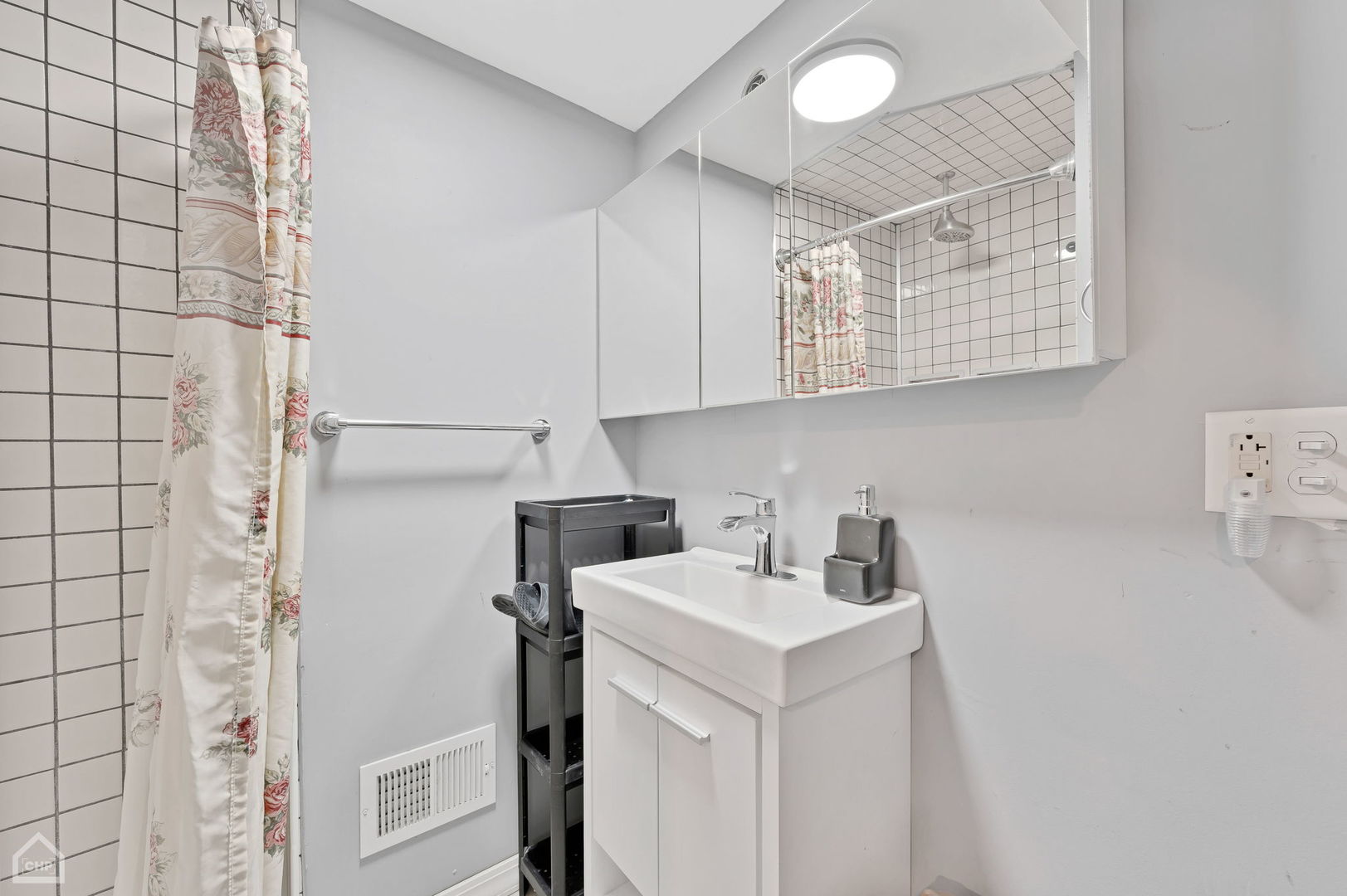 3736 West 70th Street Chicago, IL 60629 - Photo 20 of 21 a view of a storage & utility room with a window