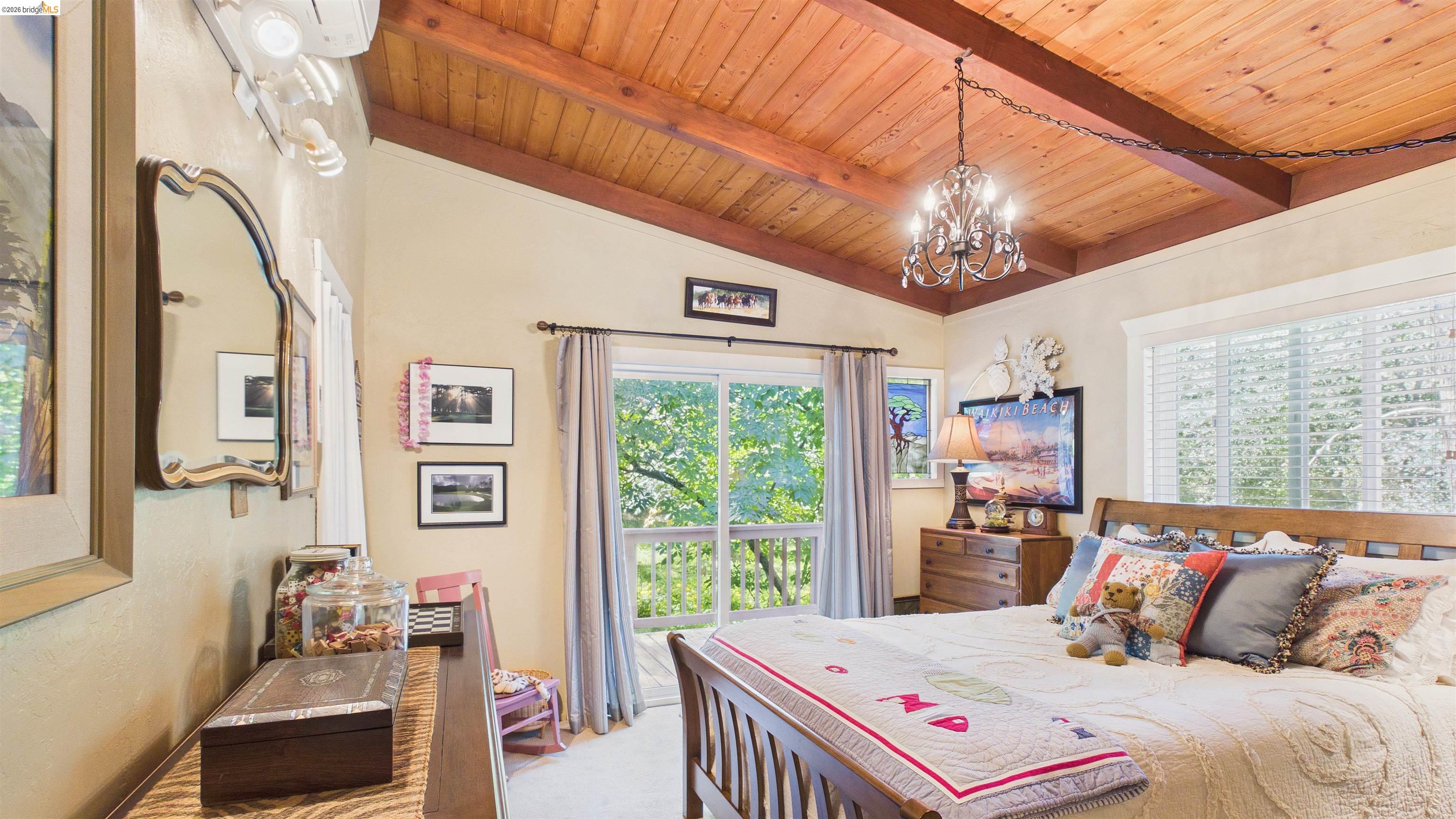 18102 Mt Eaton Road Tuolumne, CA 95379 - Photo 17 of 44 Vaulted wood-paneled ceiling with exposed beams