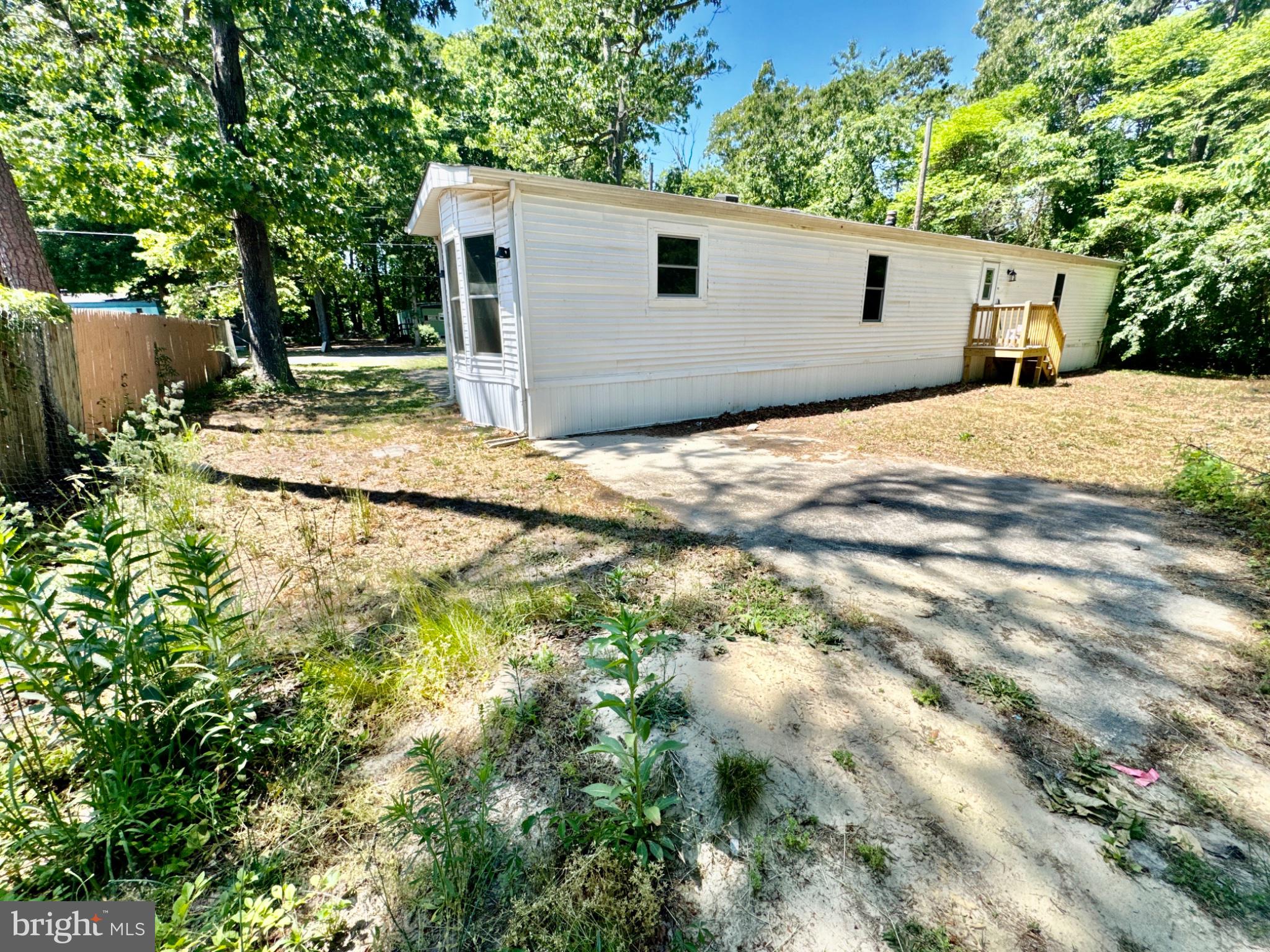 448 Evergreen Road Millville, NJ 08332 - Photo 6 of 25 a backyard of a house with table and chairs