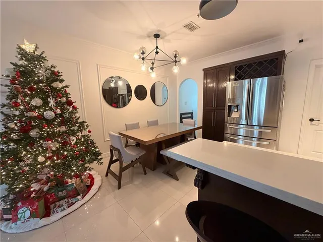 a room with a table and chairs