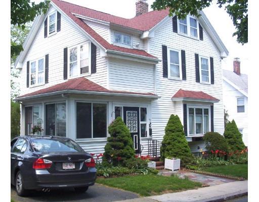 40 Huntley Road Quincy, MA 02169 - Photo 2 of 15 a front view of a house with a garden