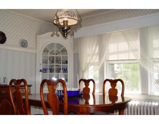 40 Huntley Road Quincy, MA 02169 - Photo 5 of 15 a view of a dining room with furniture chandelier and a large window