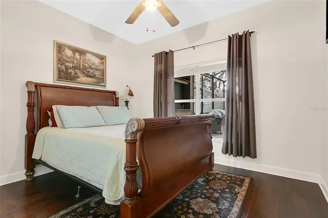 a bed room with a bed and a window