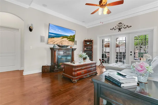 a living room with furniture and a fireplace