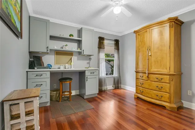 a view of kitchen with furniture and wooden floor