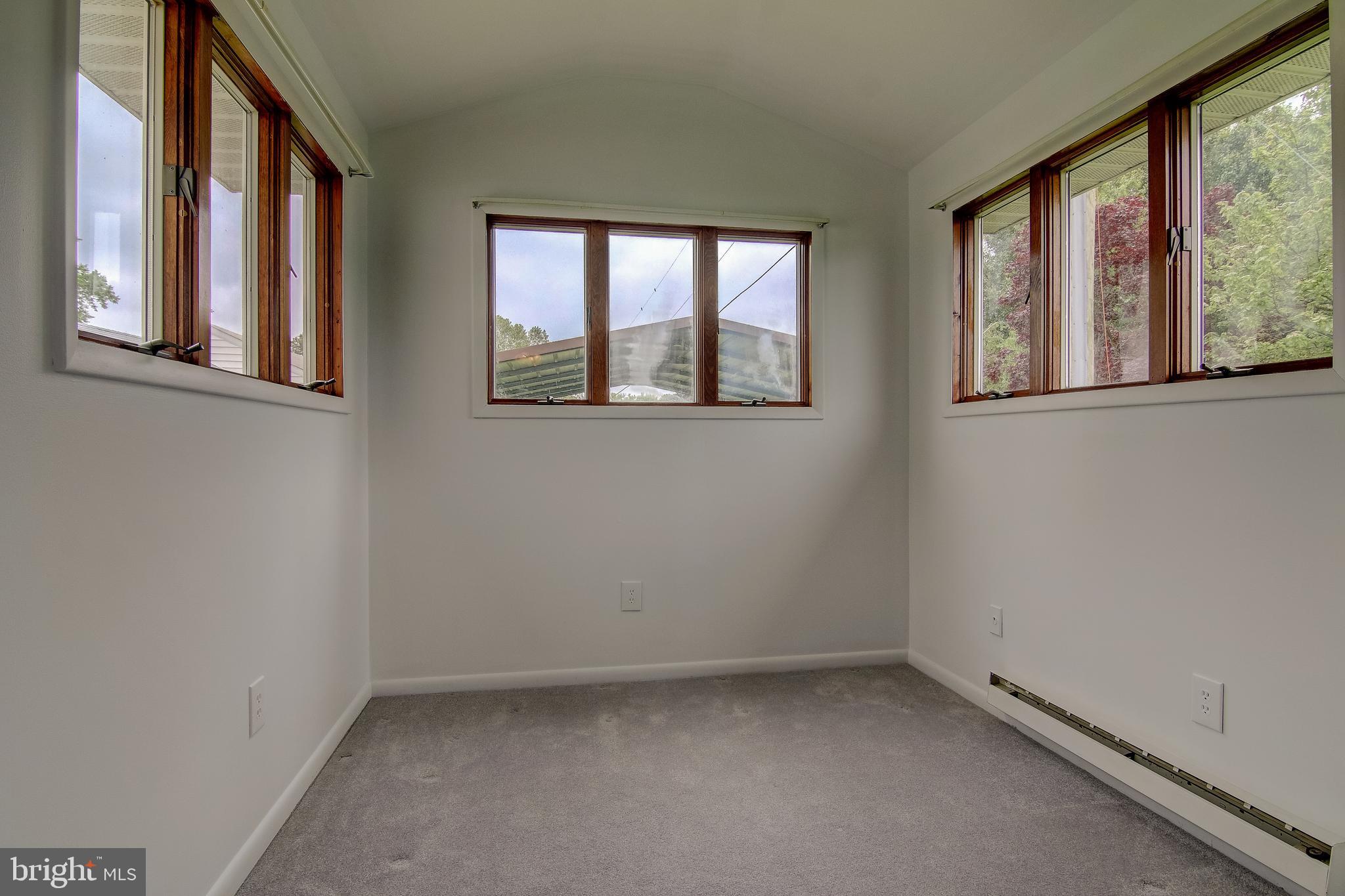 1602 Deep Point Road Woolford, MD 21677 - Photo 22 of 90 an empty room with windows