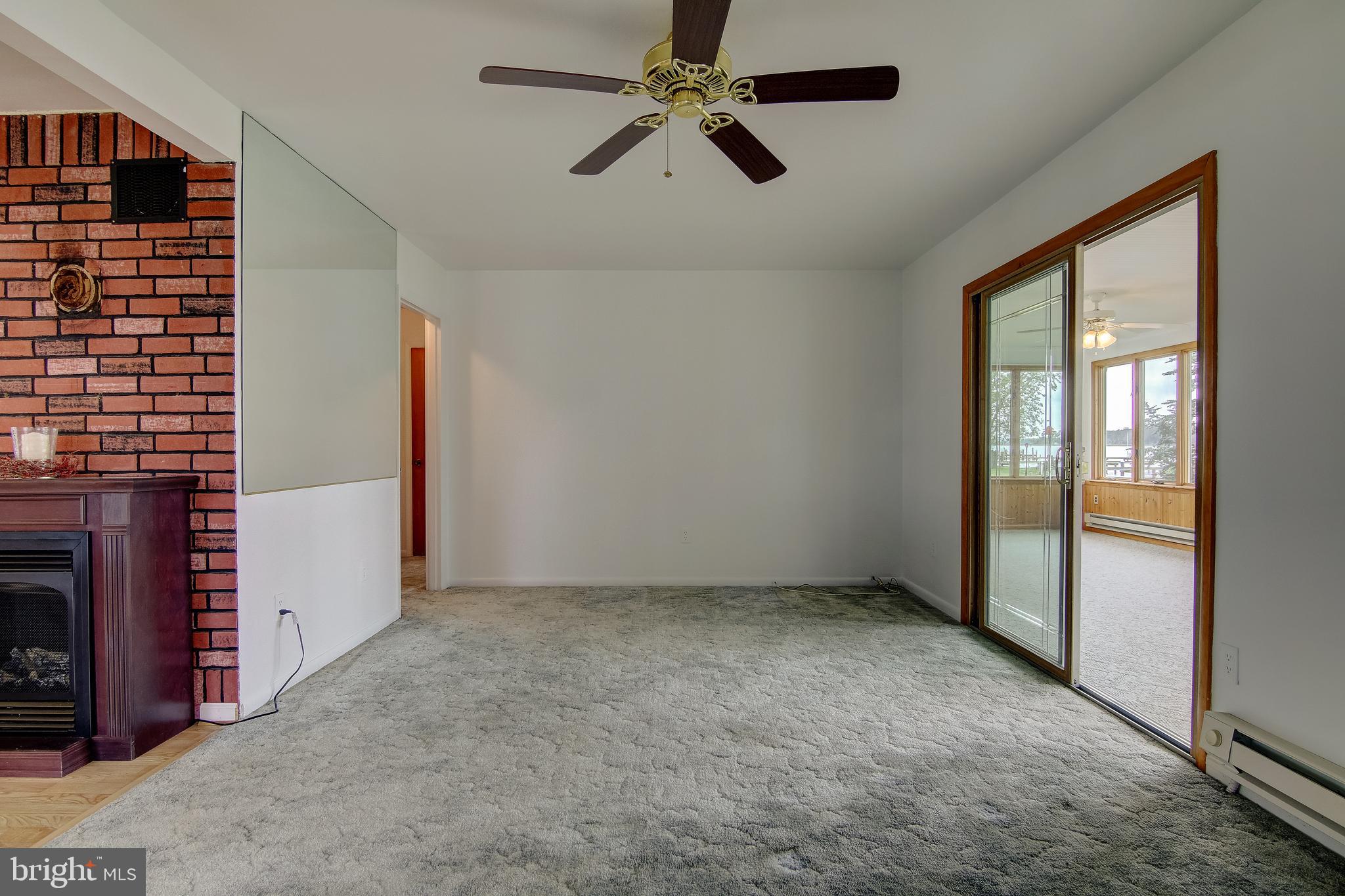 1602 Deep Point Road Woolford, MD 21677 - Photo 40 of 90 a view of an empty room with a window