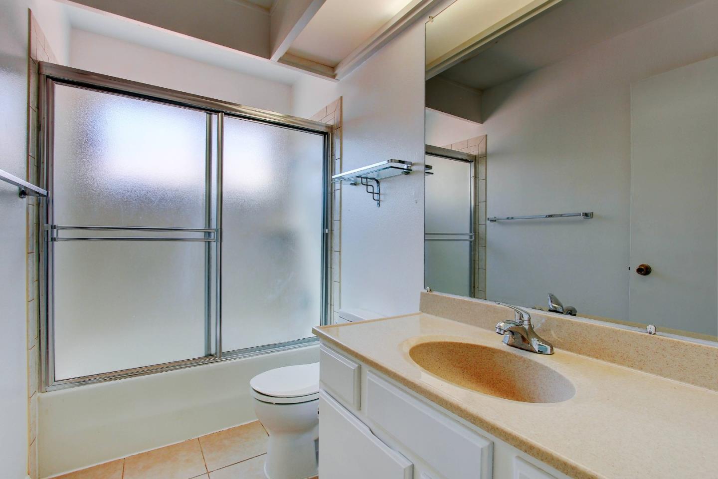 258 Paseo Bernal Moraga, CA 94556 - Photo 12 of 43 a bathroom with a sink and a mirror