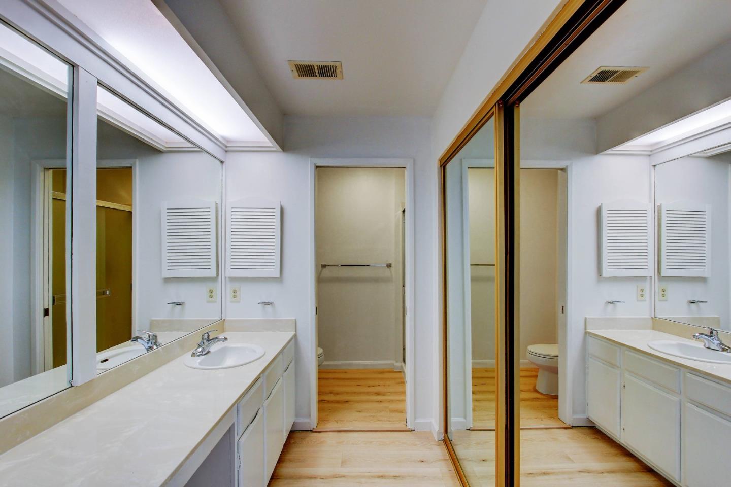 258 Paseo Bernal Moraga, CA 94556 - Photo 16 of 43 a bathroom with a tub sink and mirror