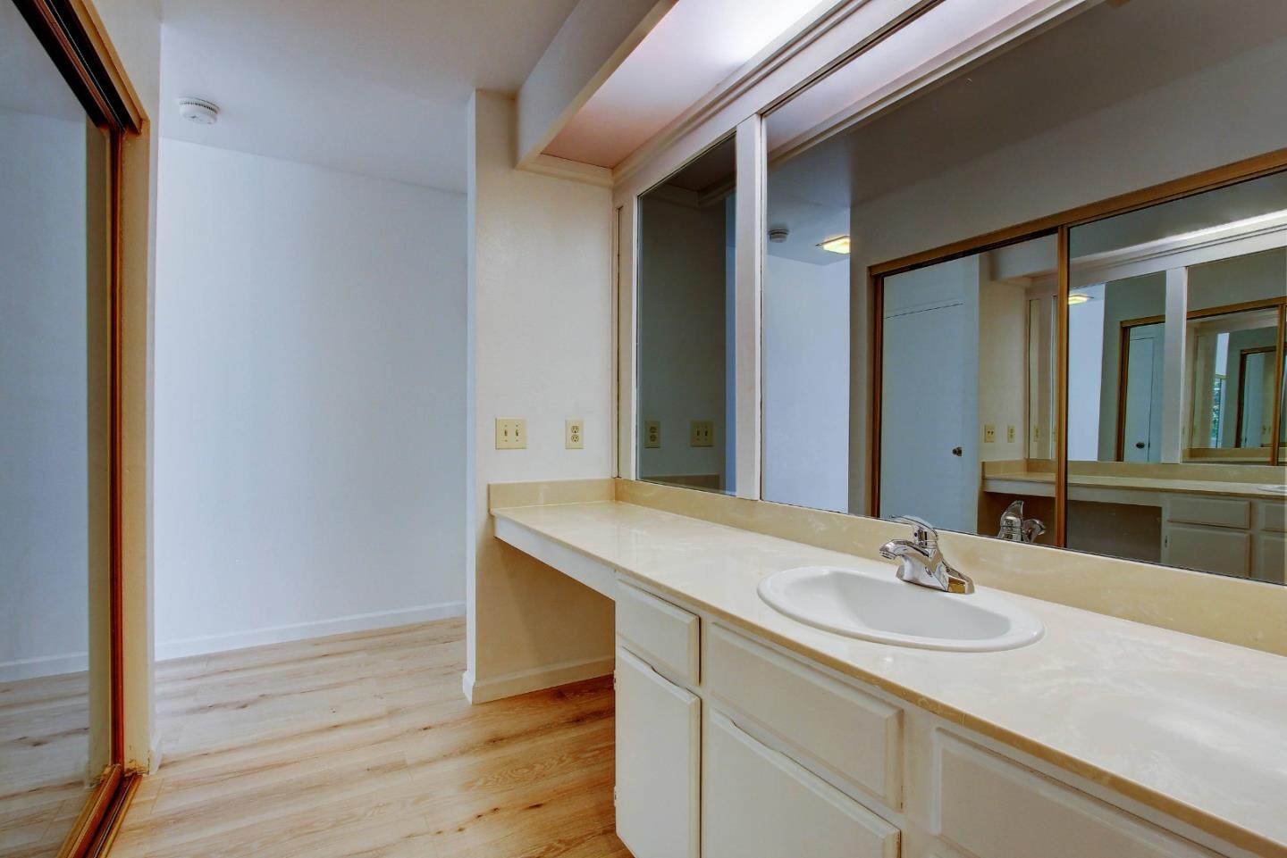 258 Paseo Bernal Moraga, CA 94556 - Photo 18 of 43 a bathroom with a sink and a mirror